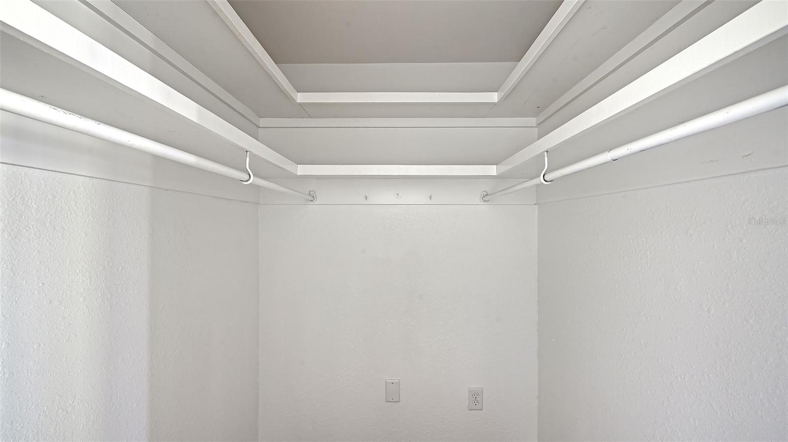 Primary Bedroom (bedroom one) walk-in closet.
