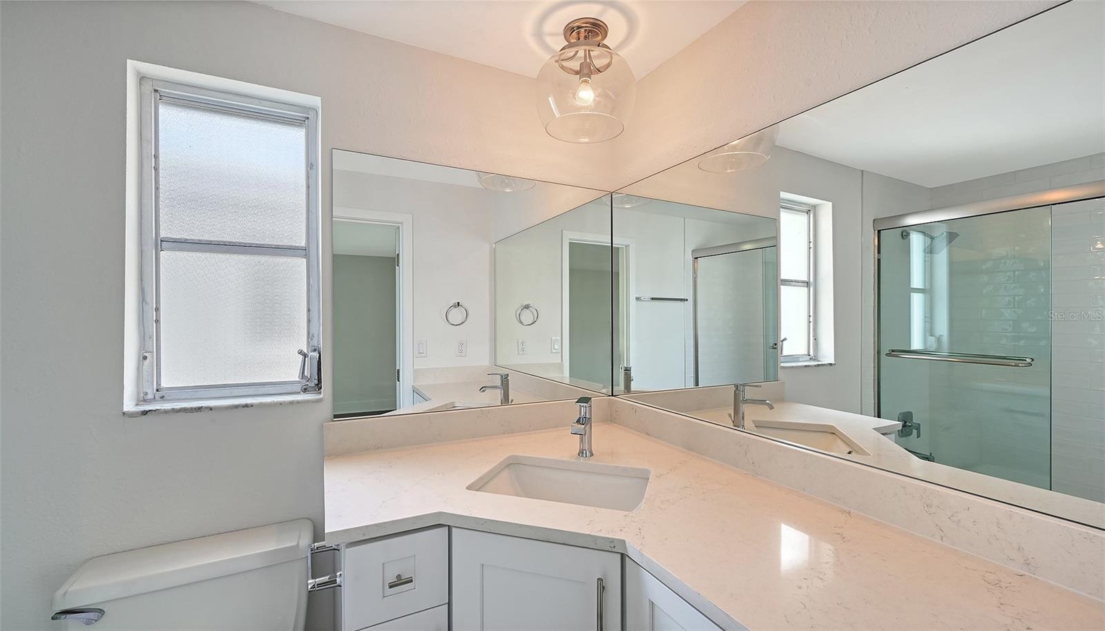 Primary bathroom with tub/shower combo.