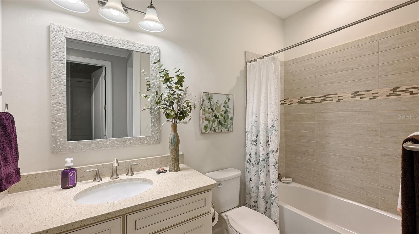 Guest bathroom alongside the third bedroom.
