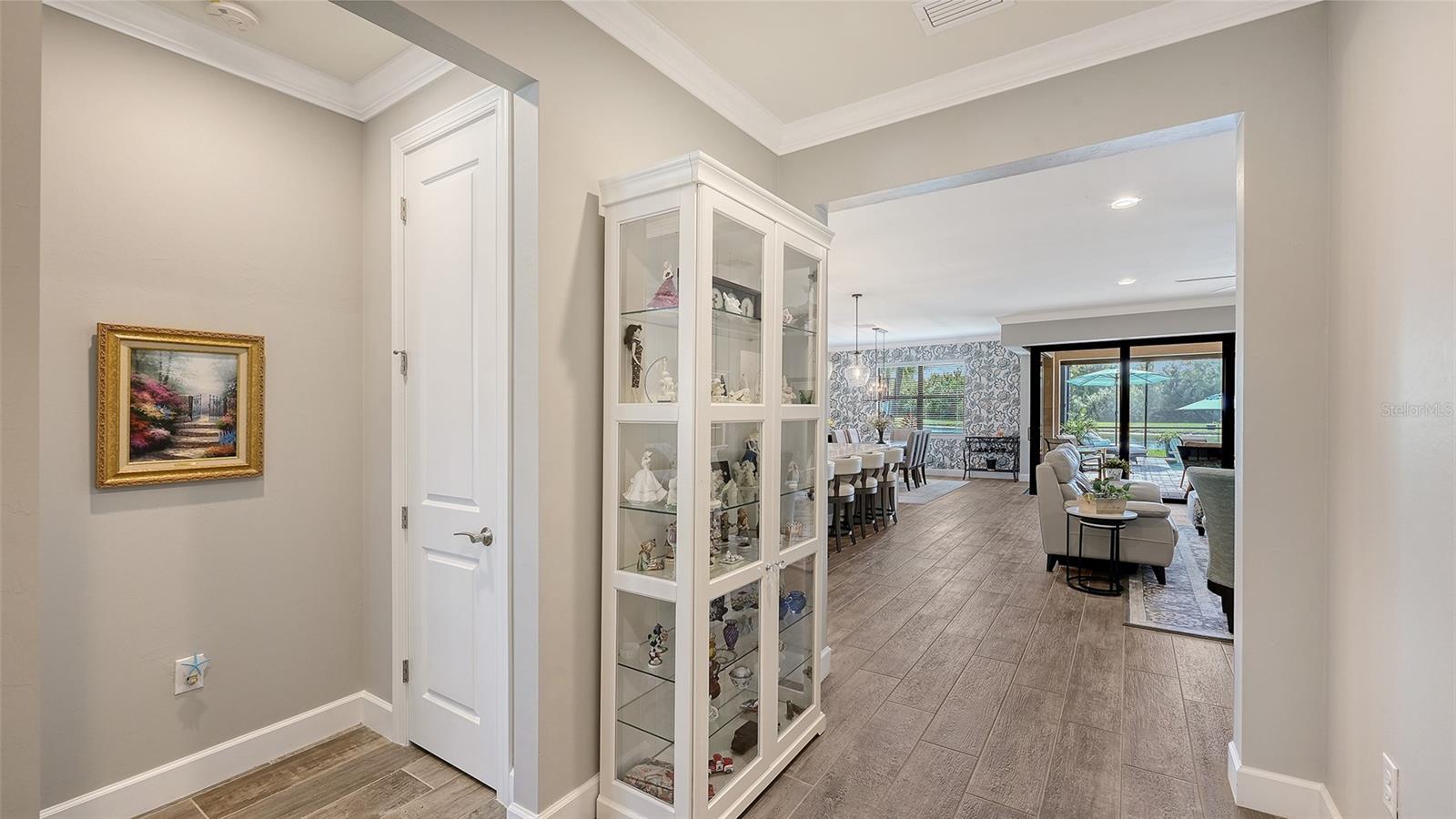 A gracious entrance welcomes you into this exceptional home, setting the tone for the inviting spaces that await within.