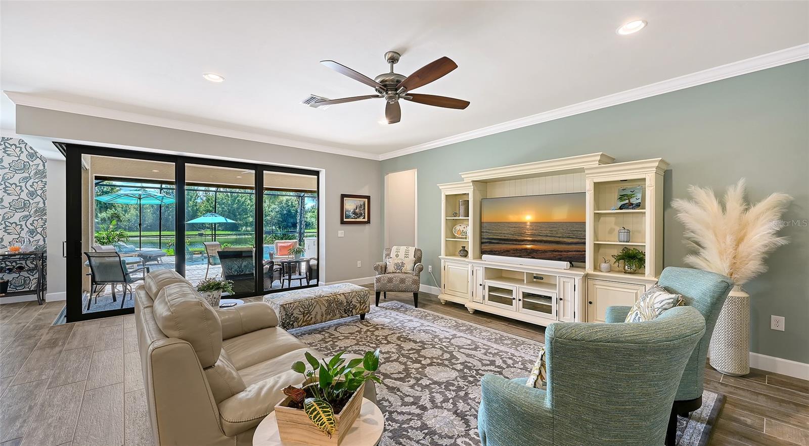 This inviting great room provides the perfect setting to unwind, relax, and enjoy the comfort of this exceptional home.