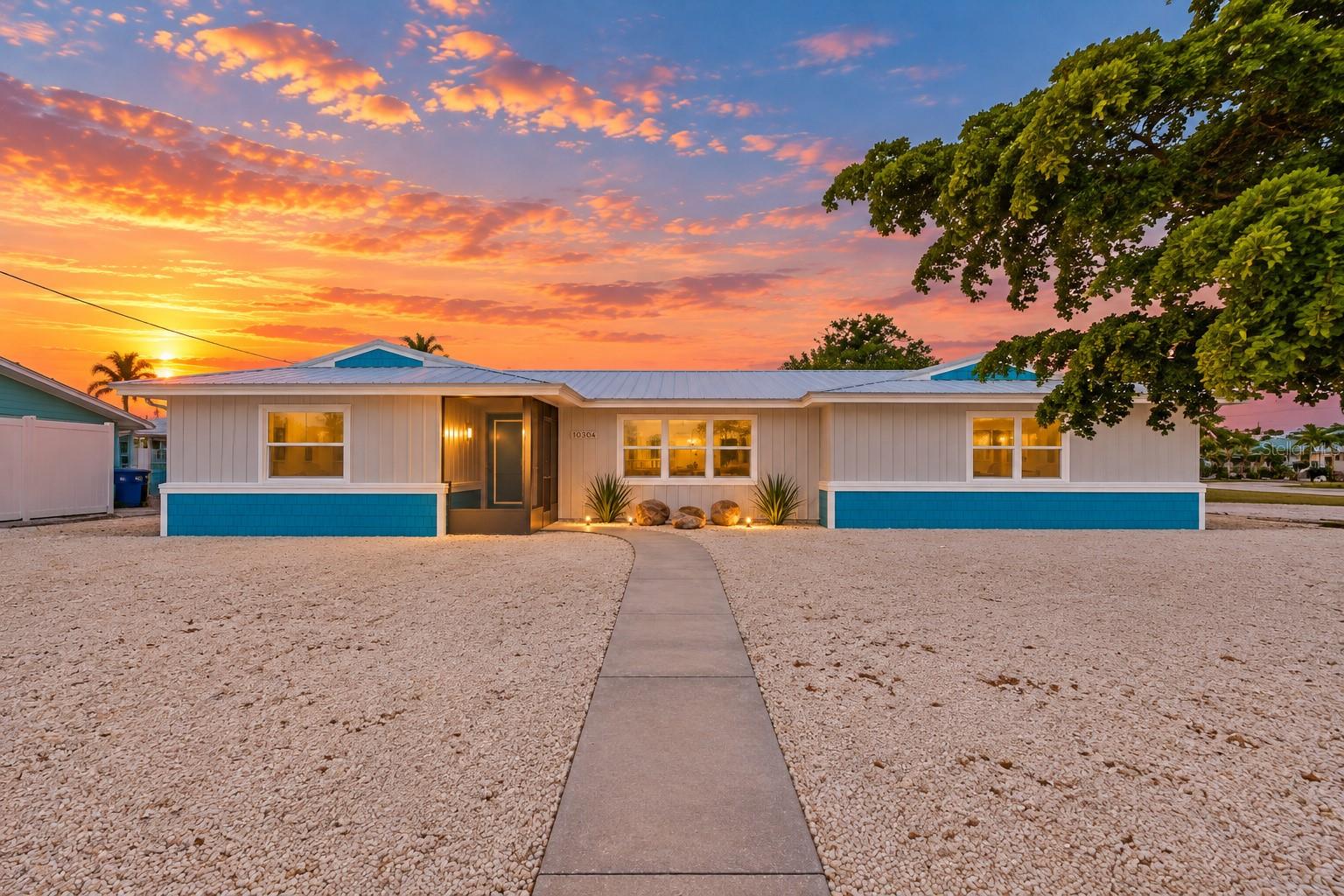 10304 Kingfisher Rd W - Exterior Sunset 10304 Kingfisher Rd W - Exterior Sunset