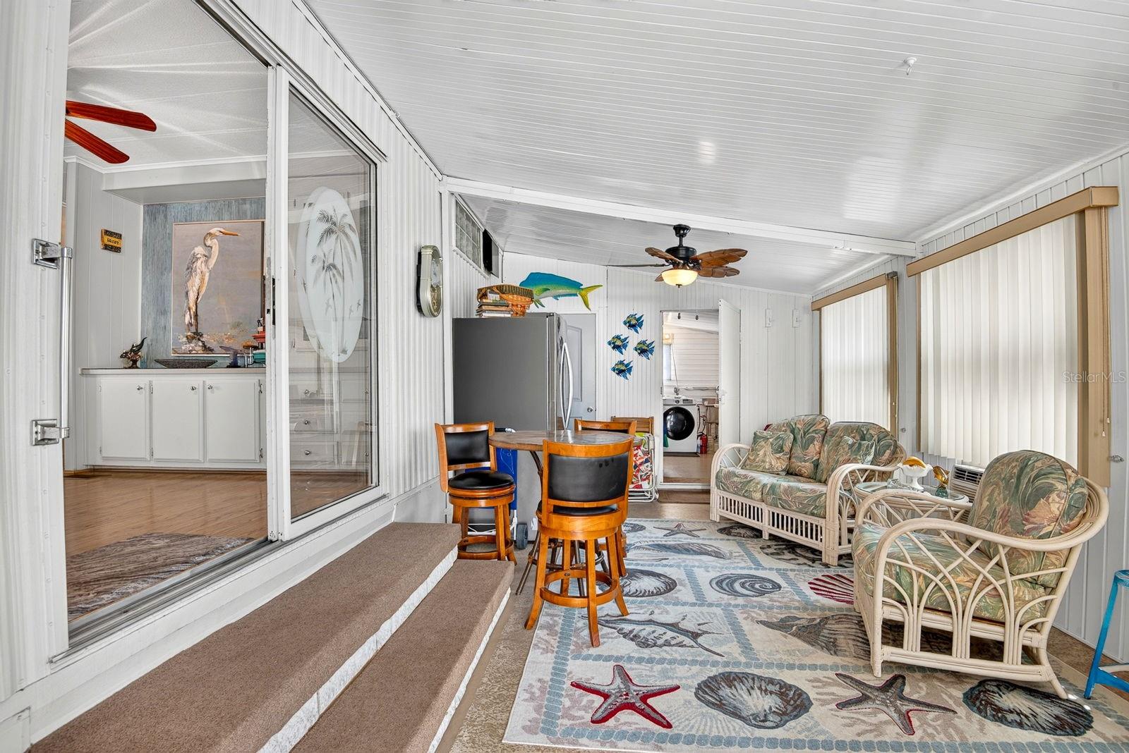 Enclosed living area to the westside of home