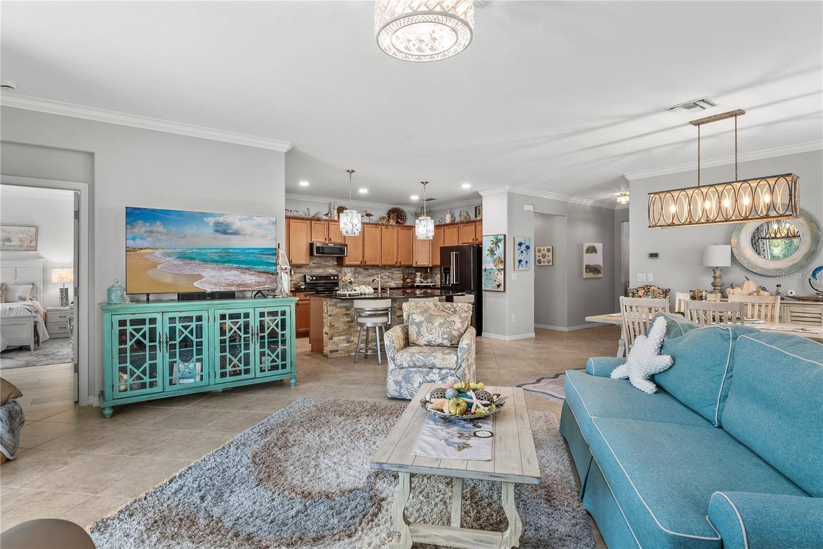 Facing into home with dining and kitchen behind