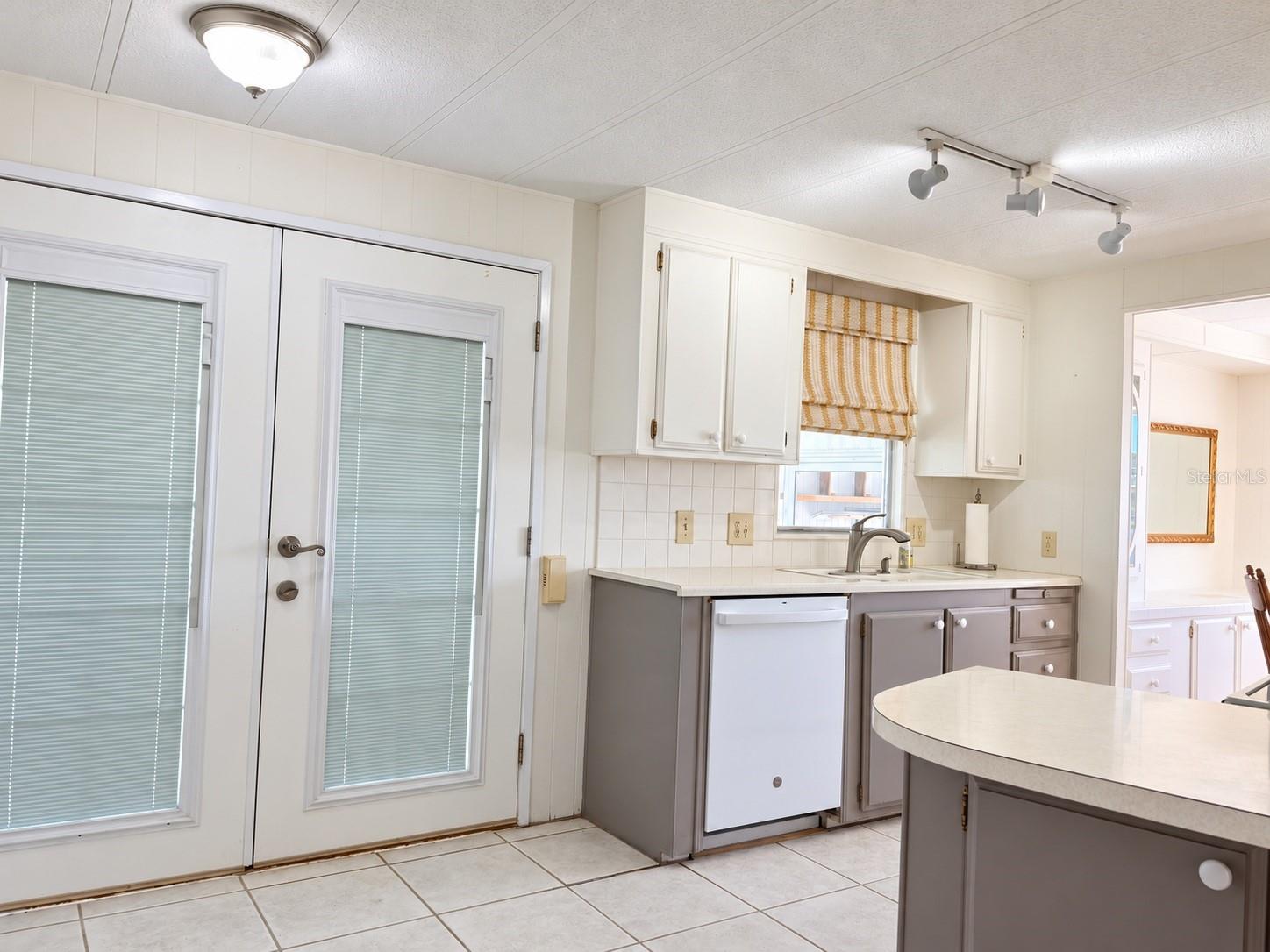 Kitchen with French entry doors Kitchen with French entry doors
