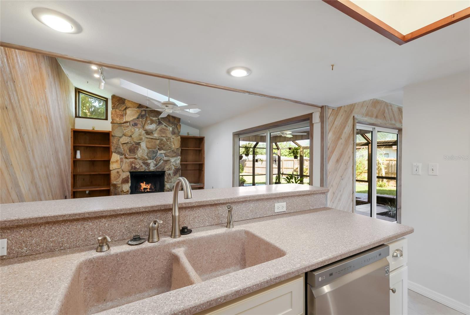 Stone Counters and double sink in kitchen