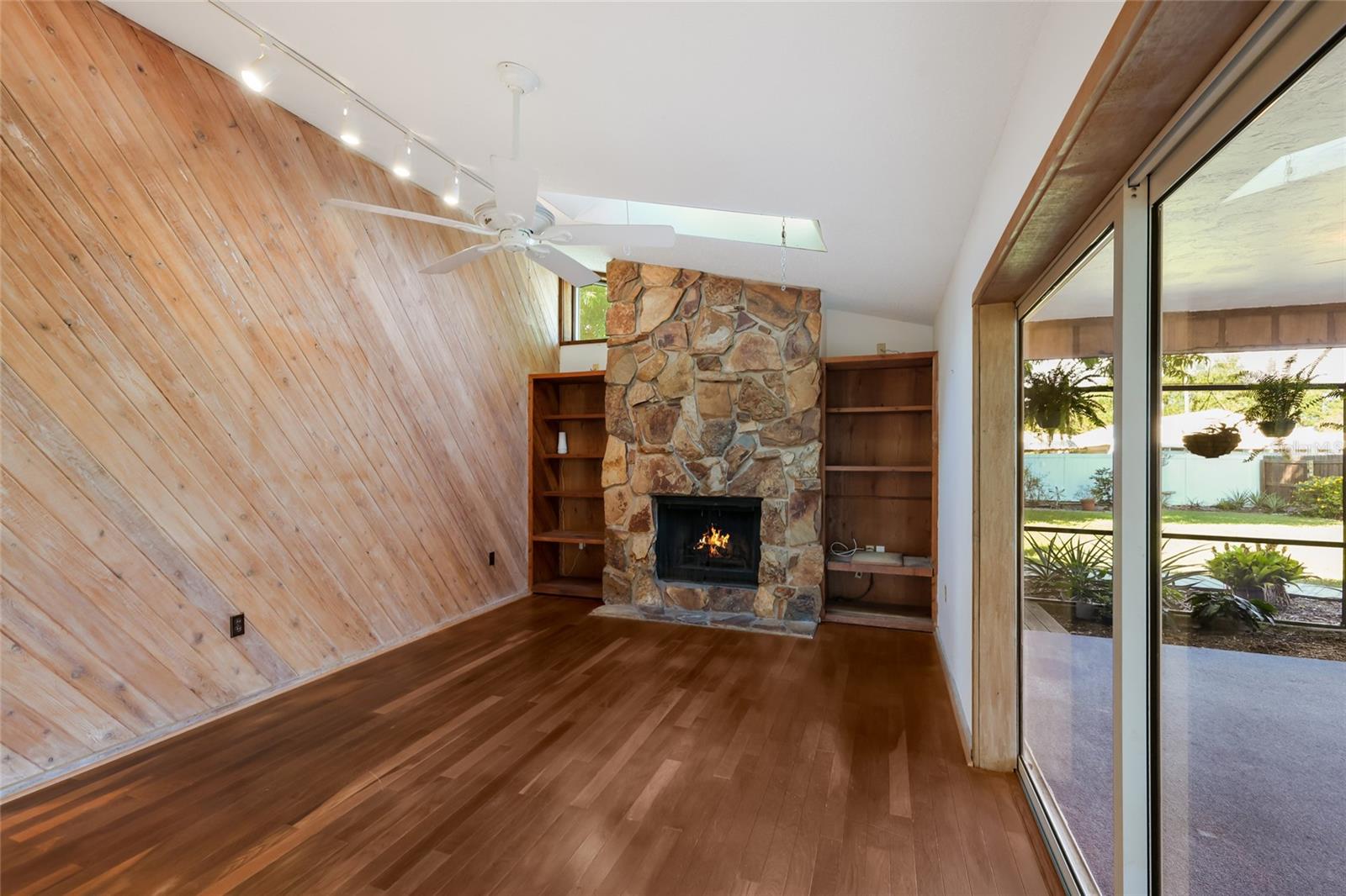Family room w/ wood burning fireplace