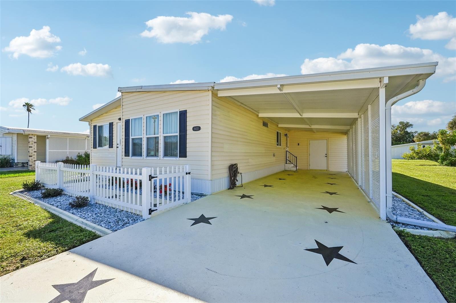 Long drive-way with covered carport and shed with laundry Long drive-way with covered carport and shed with laundry