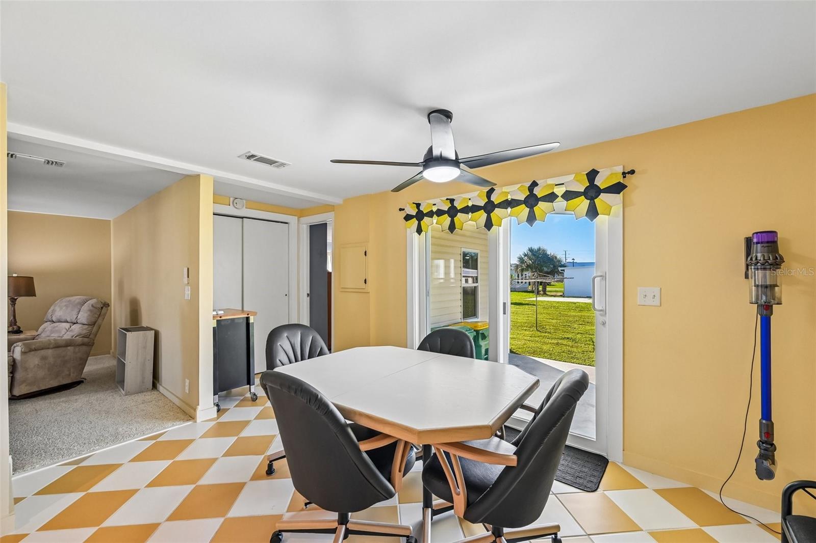 Eat-in kitchen with sliders to covered back patio