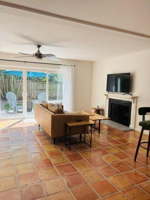 Warm & welcoming living area with wood burning fireplace Warm & welcoming living area with wood burning fireplace