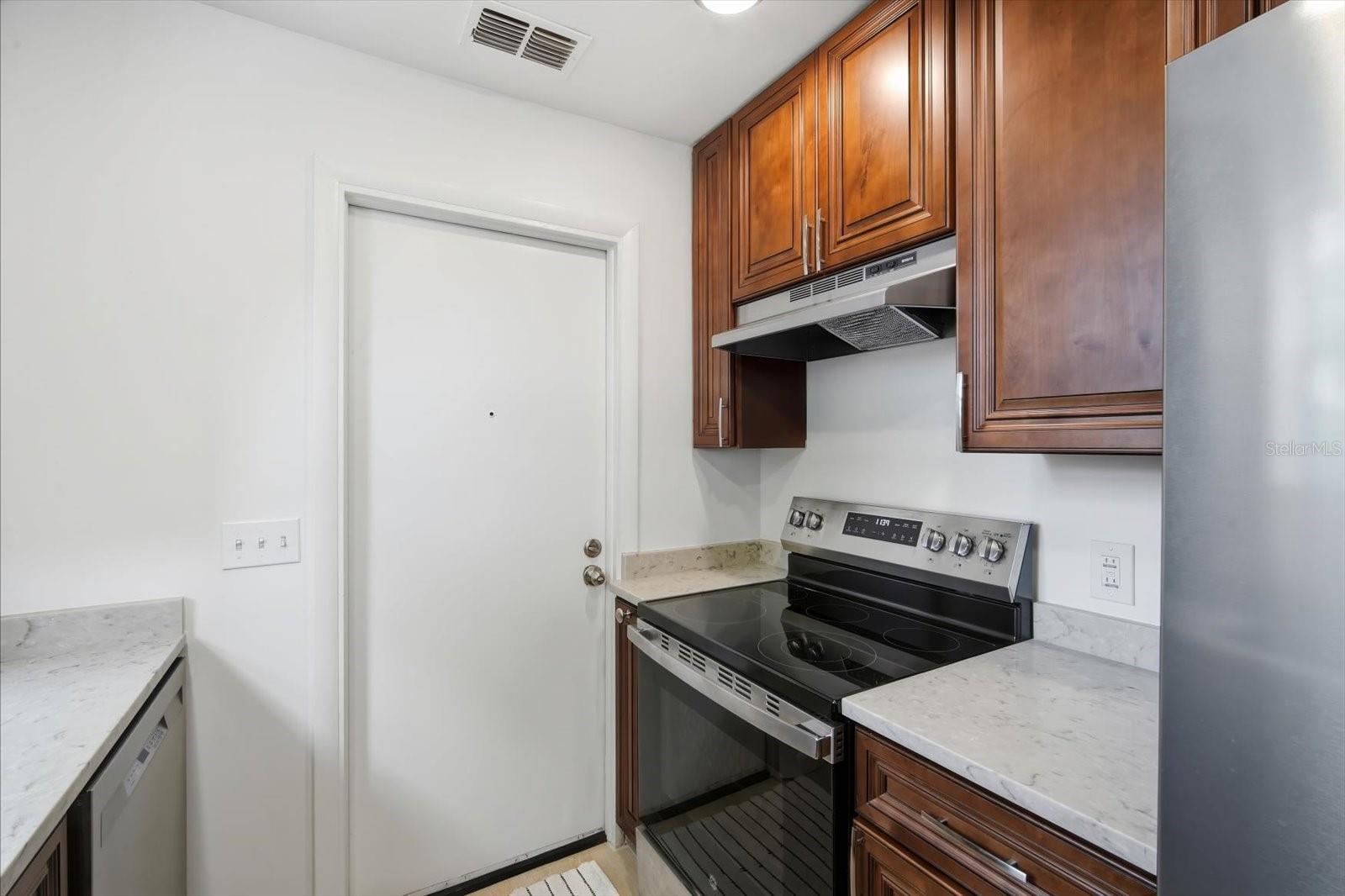 kitchen opens to garage with washer & dryer