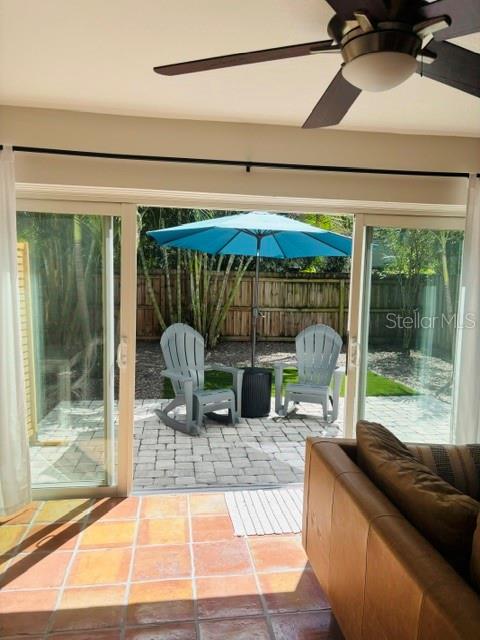 Sliders open to paved patio perfect for entertaining