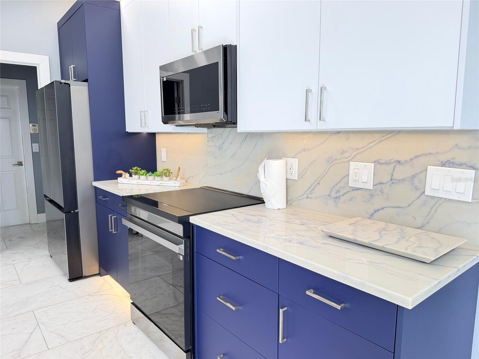 View of Cabinets in Kitchen, appliances