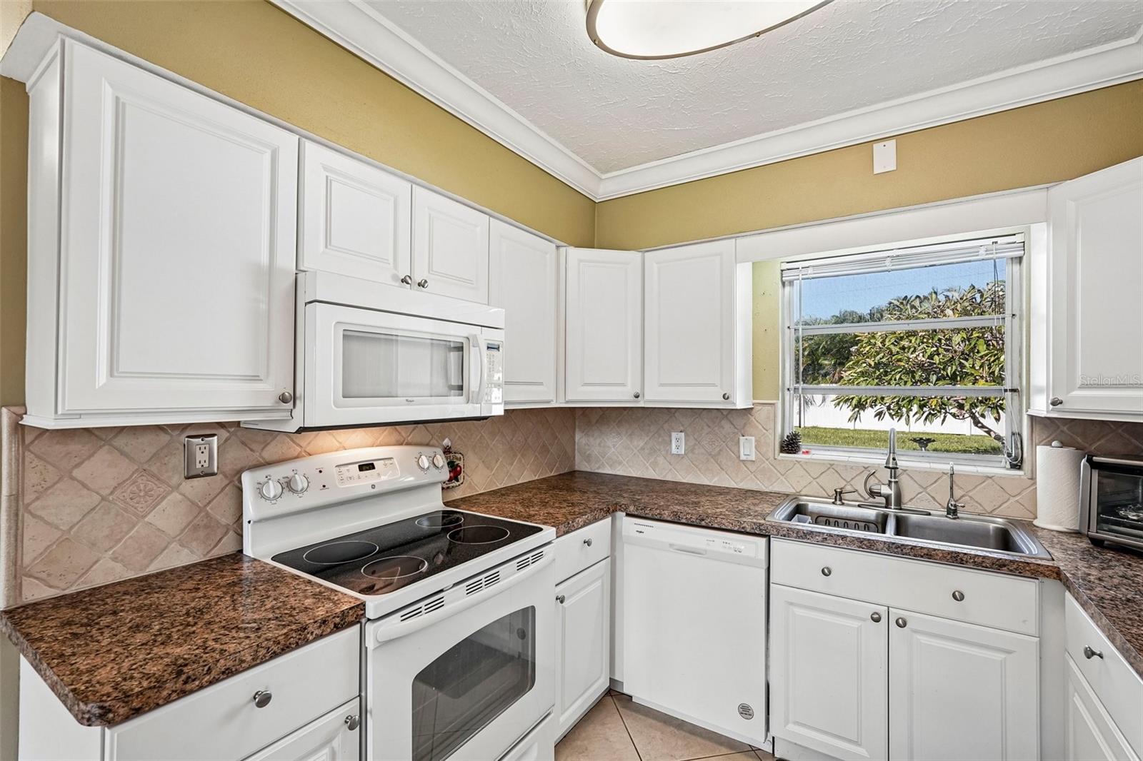 309 Kitchen overlooking large, private rear yard