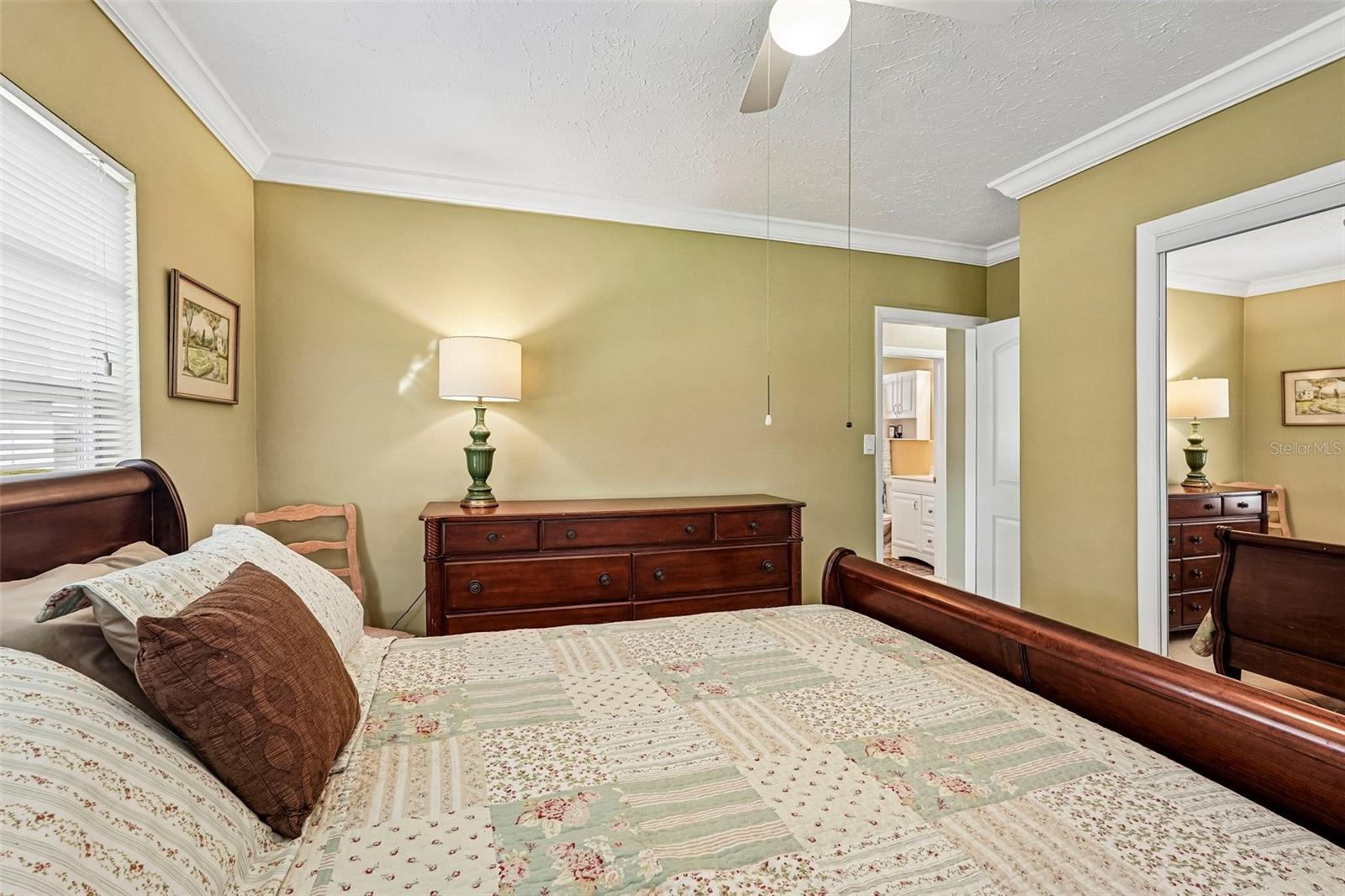 309 primary bedroom, with mirrored closet