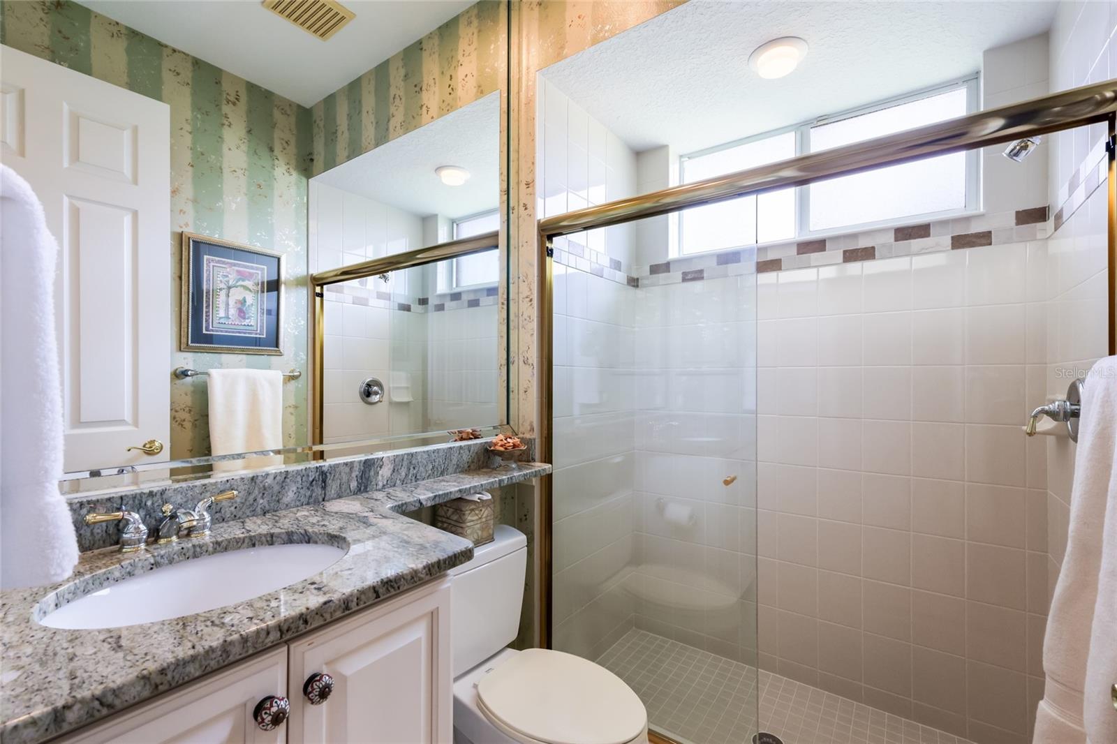Guest bath adjacent to bedroom 2