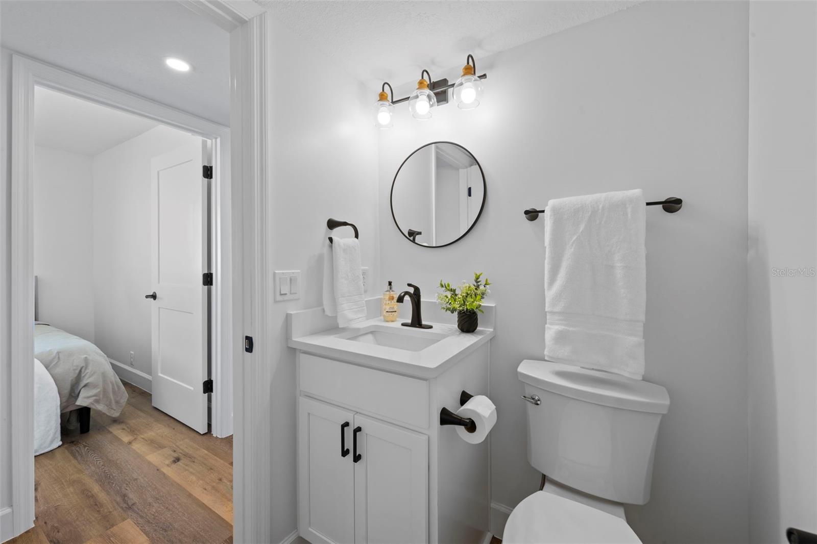 Guest bath looking into guest room
