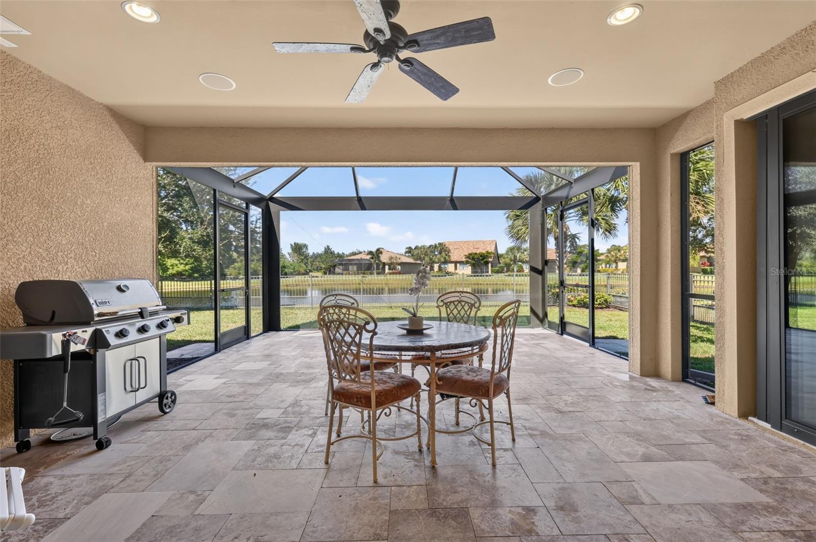 EXTENDED & SCREENED IN BACK PATIO
