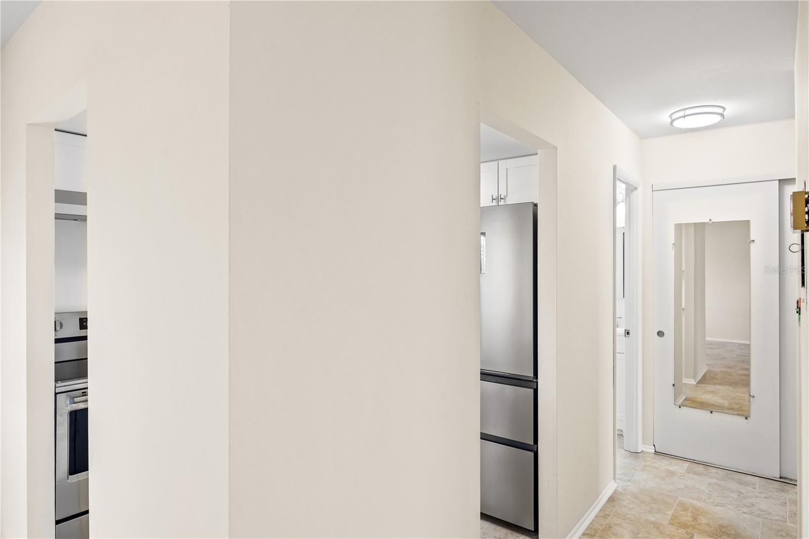 Hallway to bedroom and bathroom