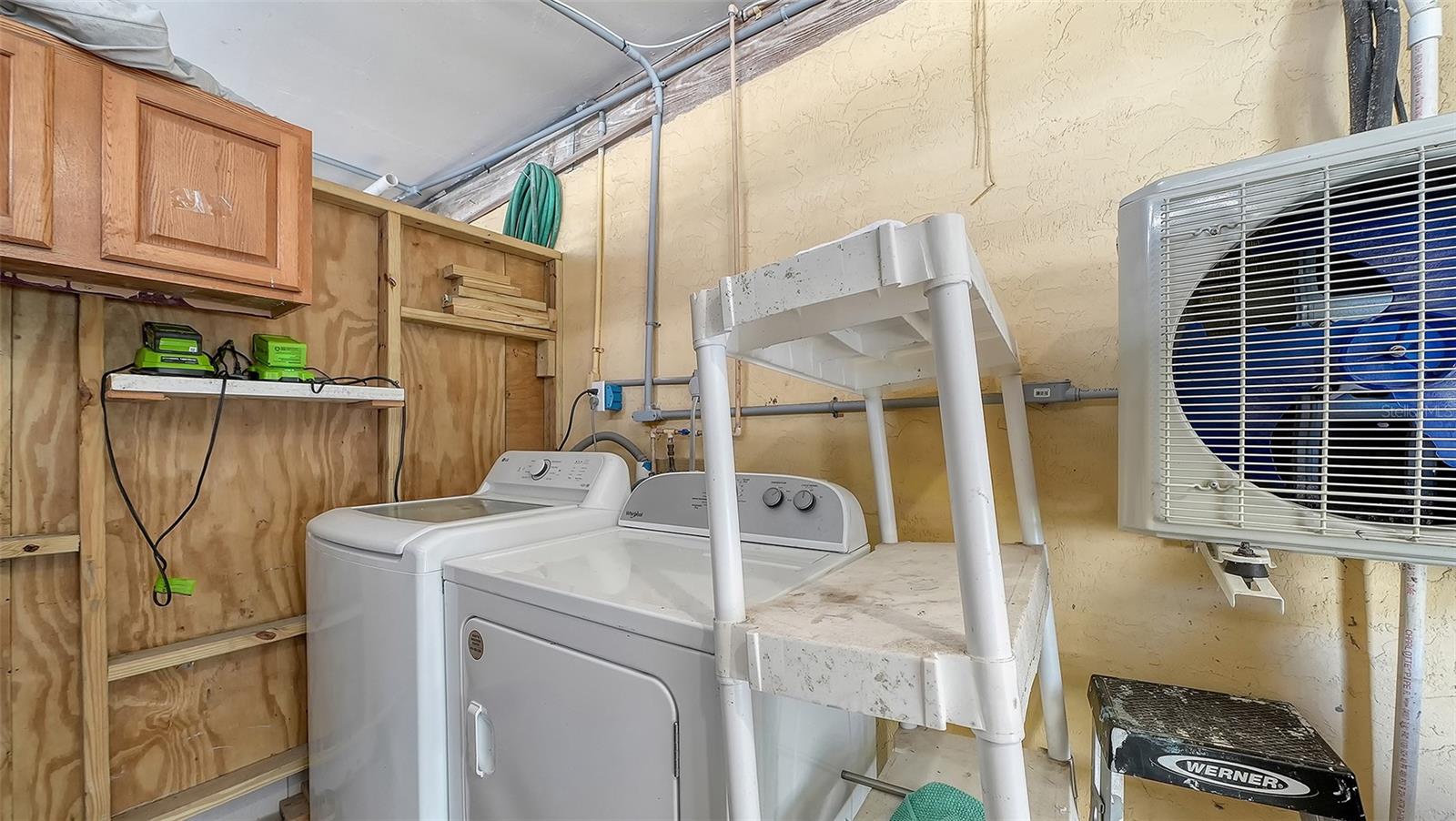 Exterior common laundry room/storage space on the ground floor.