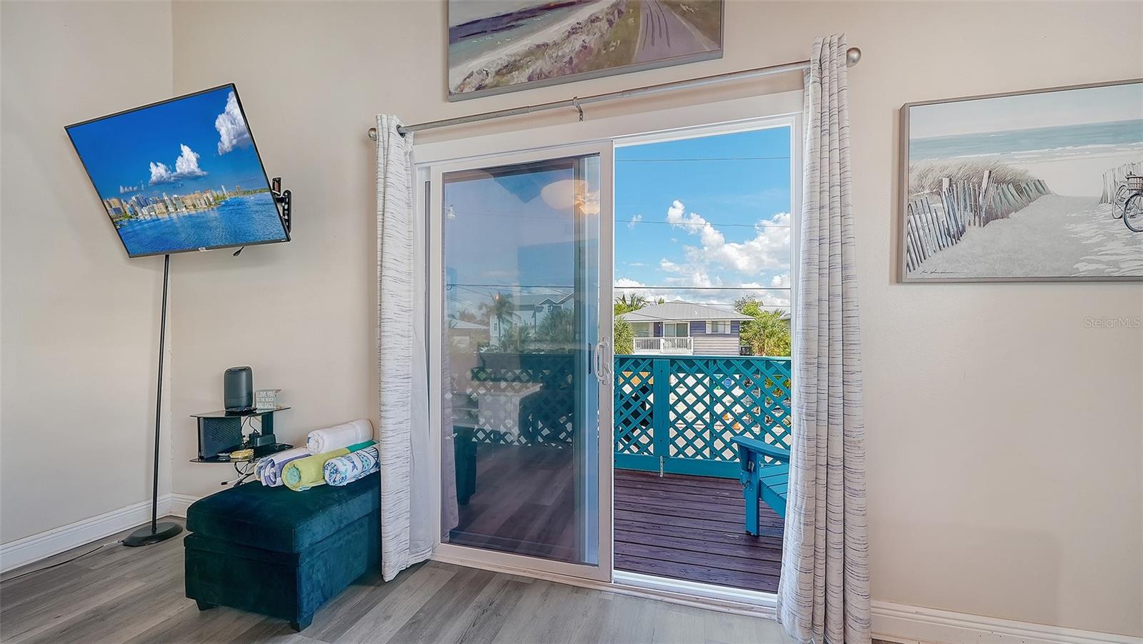 Unit A, sliding glass door to balcony.