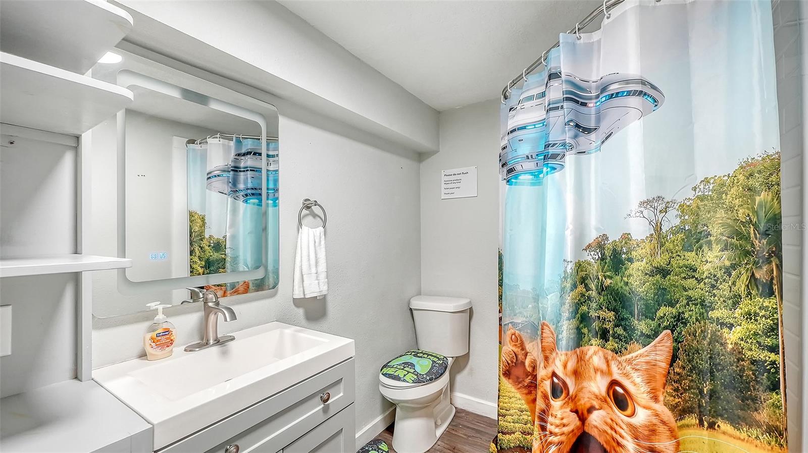 Converted garage bathroom/storage space.