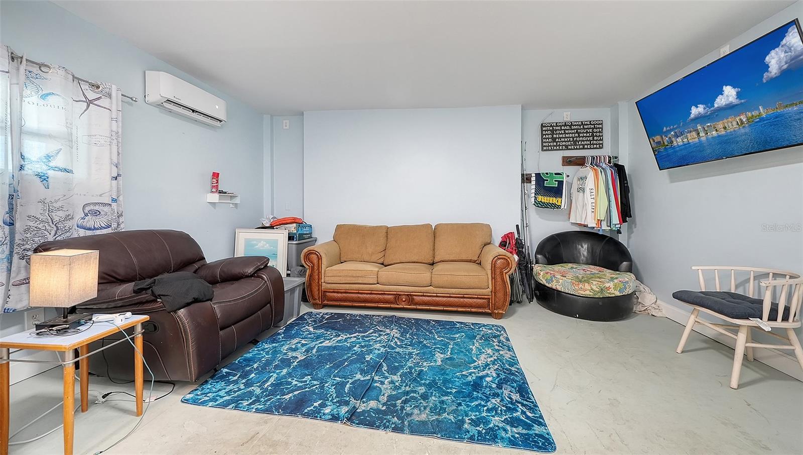 Ground floor under Unit A, efficiency apartment or in-law suite/storage space.