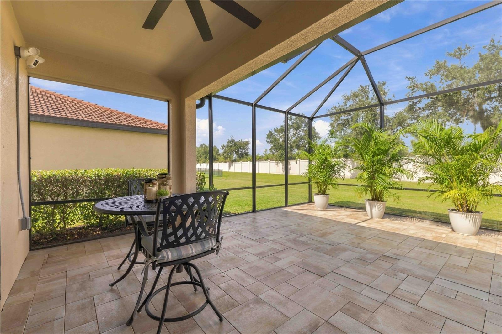 Extended, pavered, screened Lanai