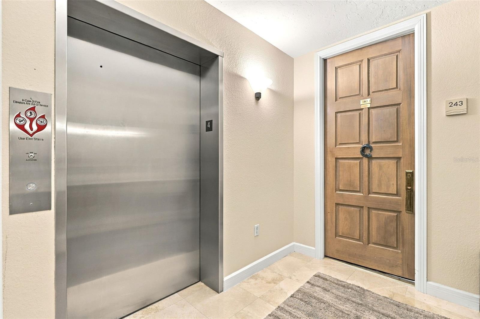 The unit is accessed via a semi-private elevator (only one other unit is on this floor).