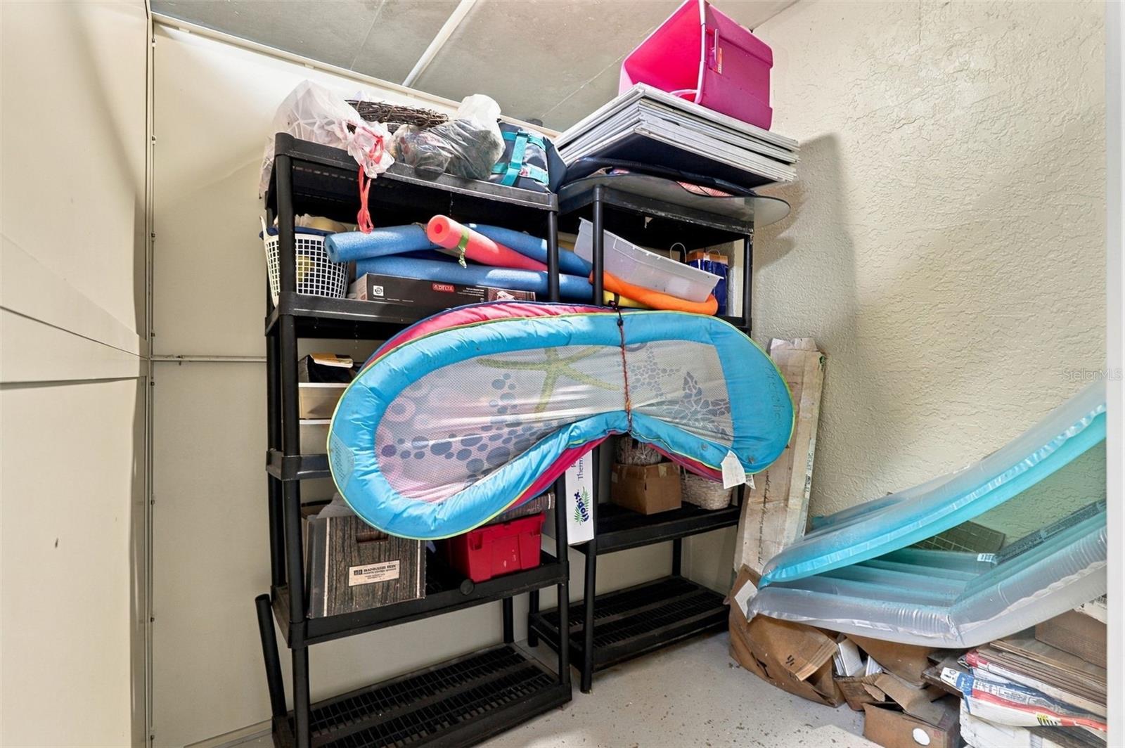 Private storage unit in the garage.