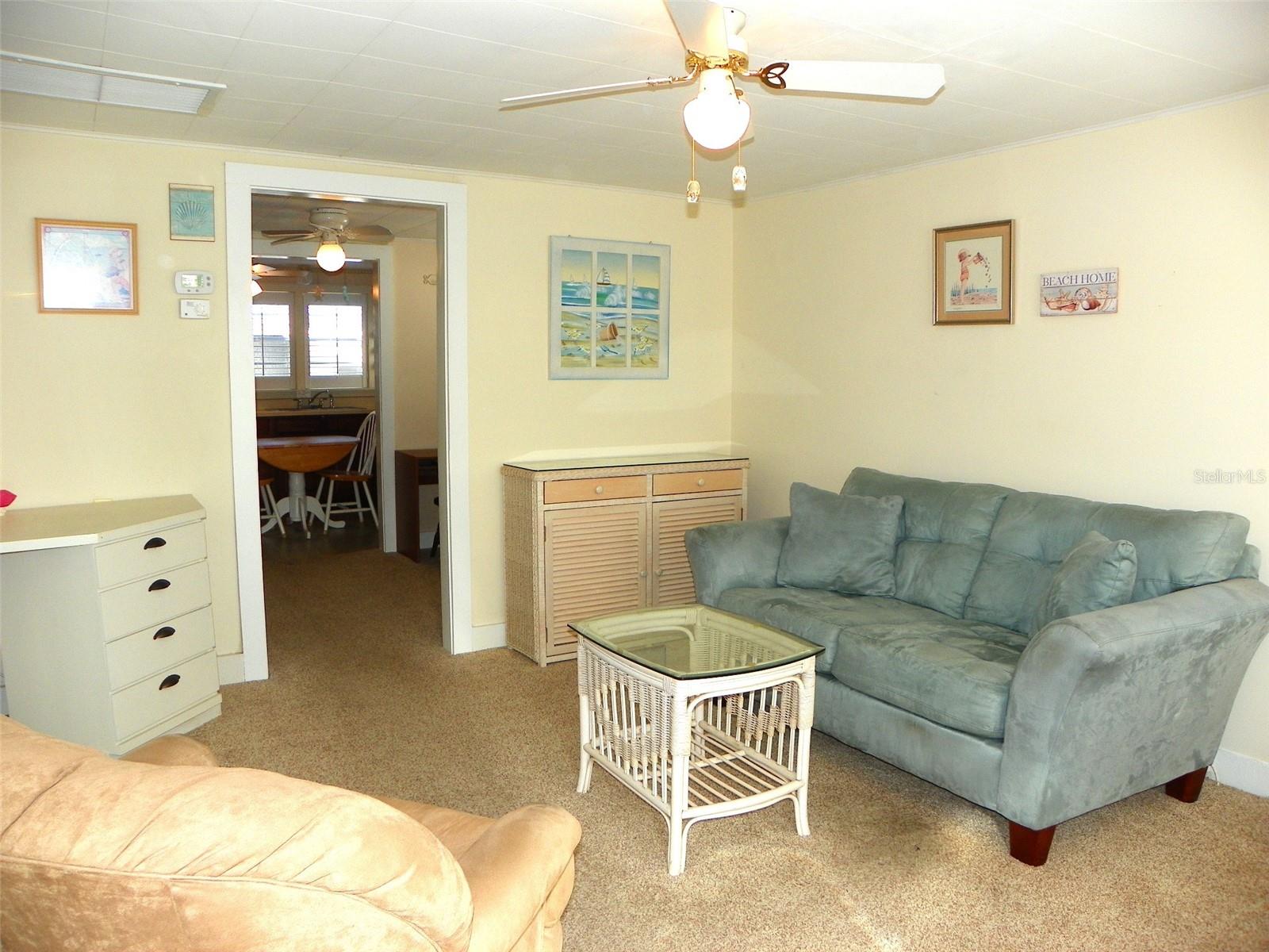 Living Room looking into dining room and kitchen
