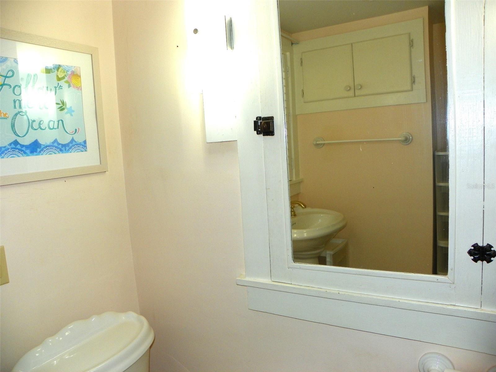Bathroom w/built-in medicine chest.