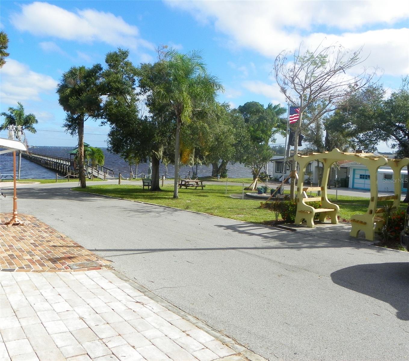Water view, fishing pier and park.