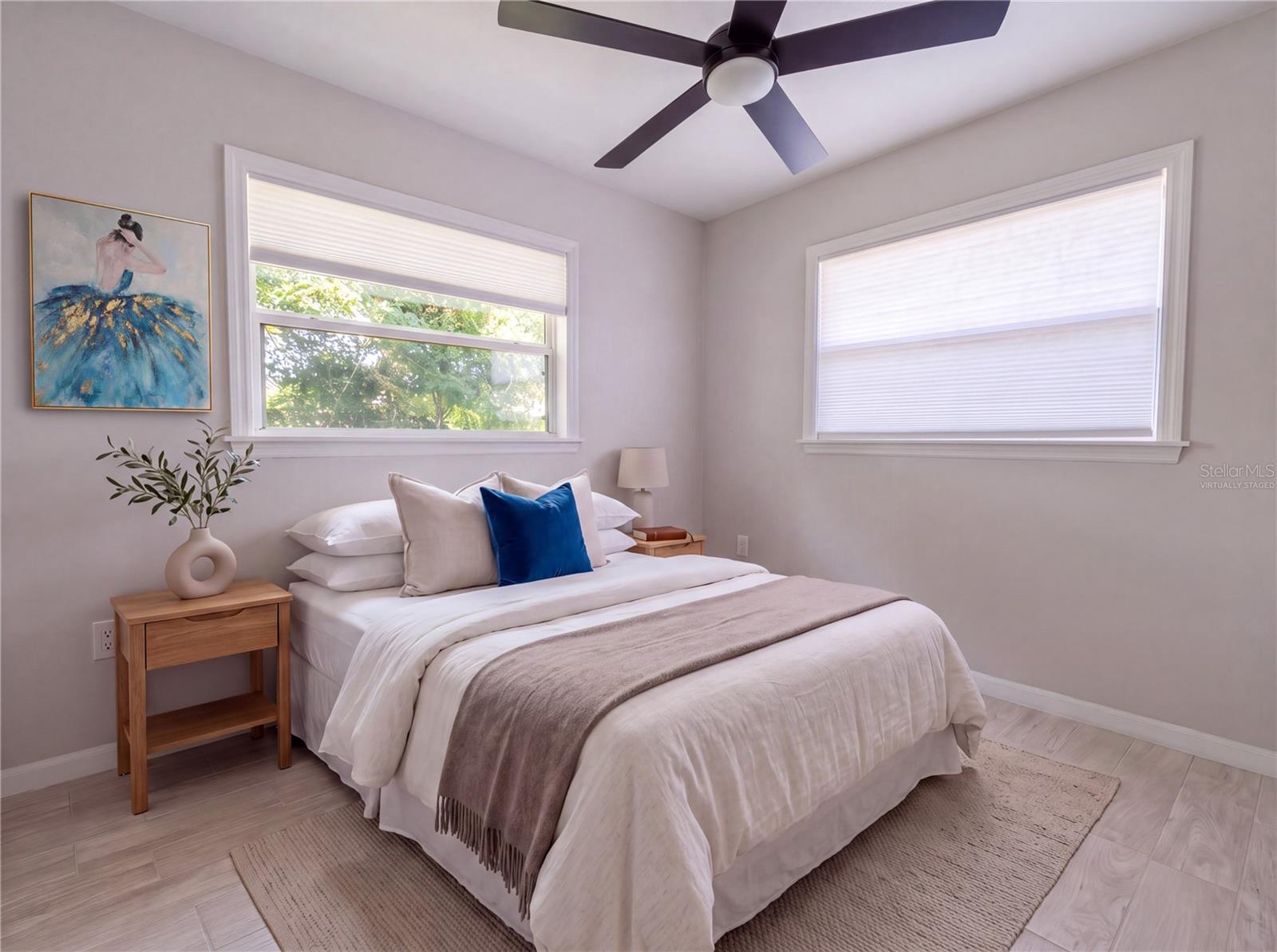 Bedroom 1. All new flooringporcelain tile.Virtually Staged Bedroom 1. All new flooringporcelain tile.Virtually Staged