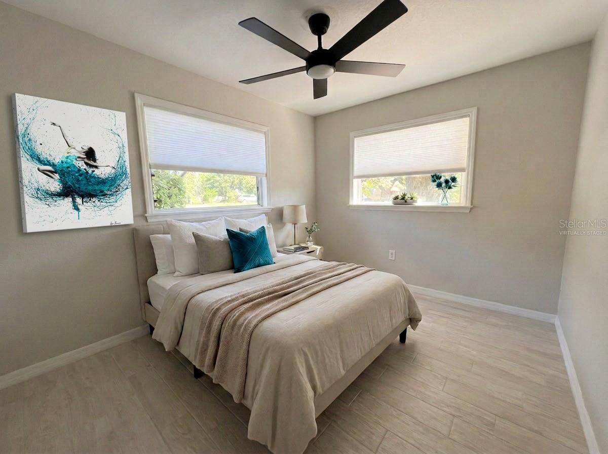 Bedroom 2. All new flooringporcelain tile.Virtually Staged Bedroom 2. All new flooringporcelain tile.Virtually Staged