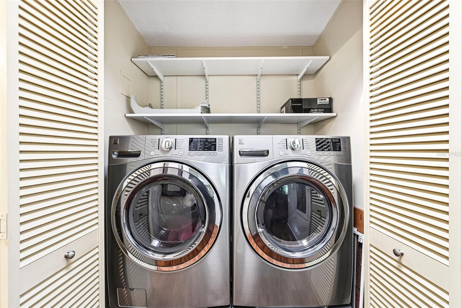 Front Loading Washer & Dryer in Closet in Hallway