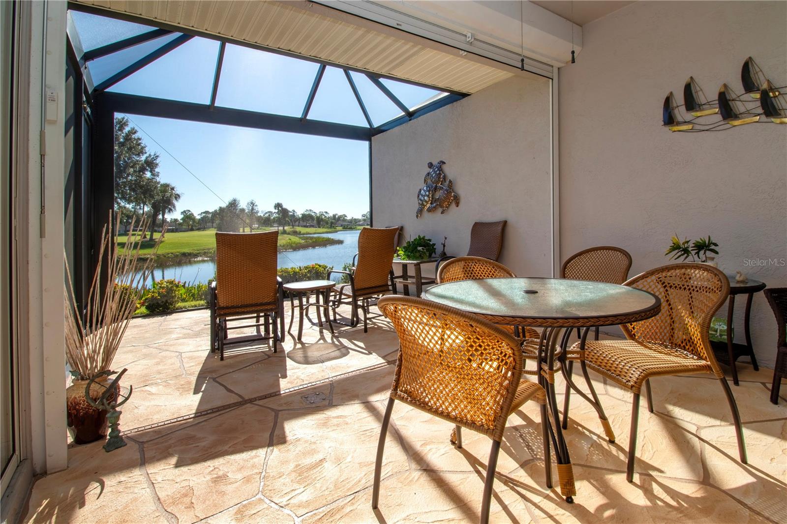 Extended Lanai, recently installed, stucco wall separation between neighbors.