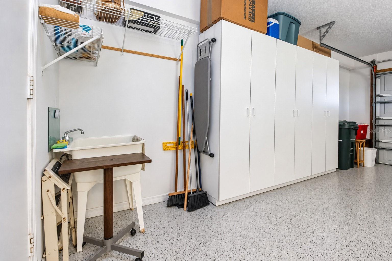Two car garage, storage, laundry sink, finished floo
