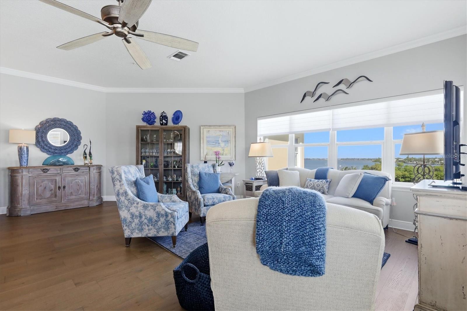 Living room has partial bay view.