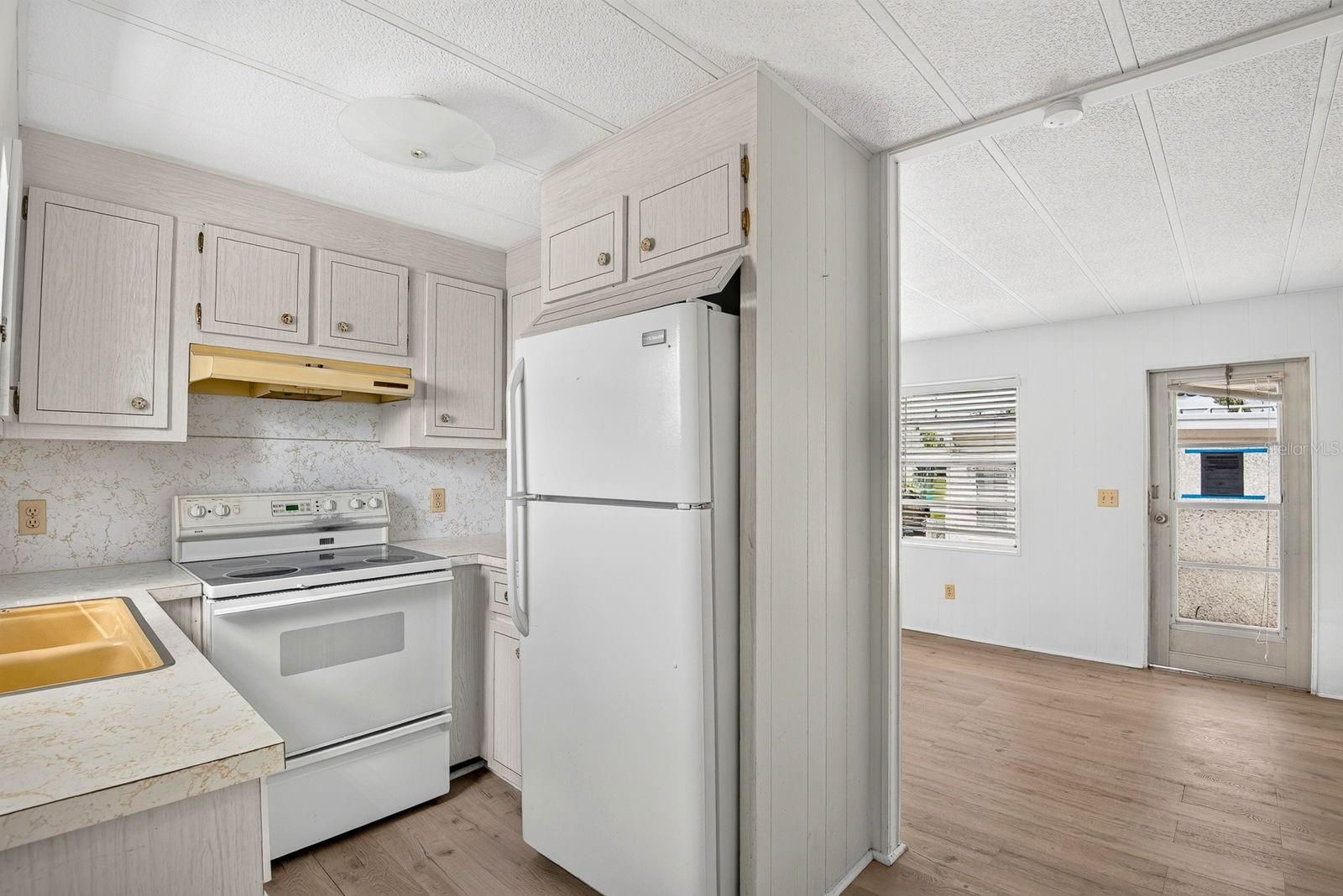 Kitchen facing into living area