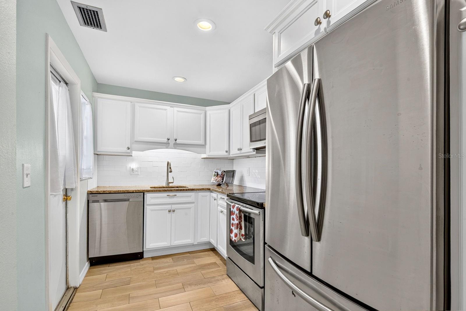 Kitchen with Door to Carport