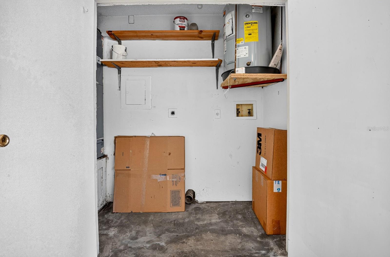 Convenient Laundry/Utility off Carport