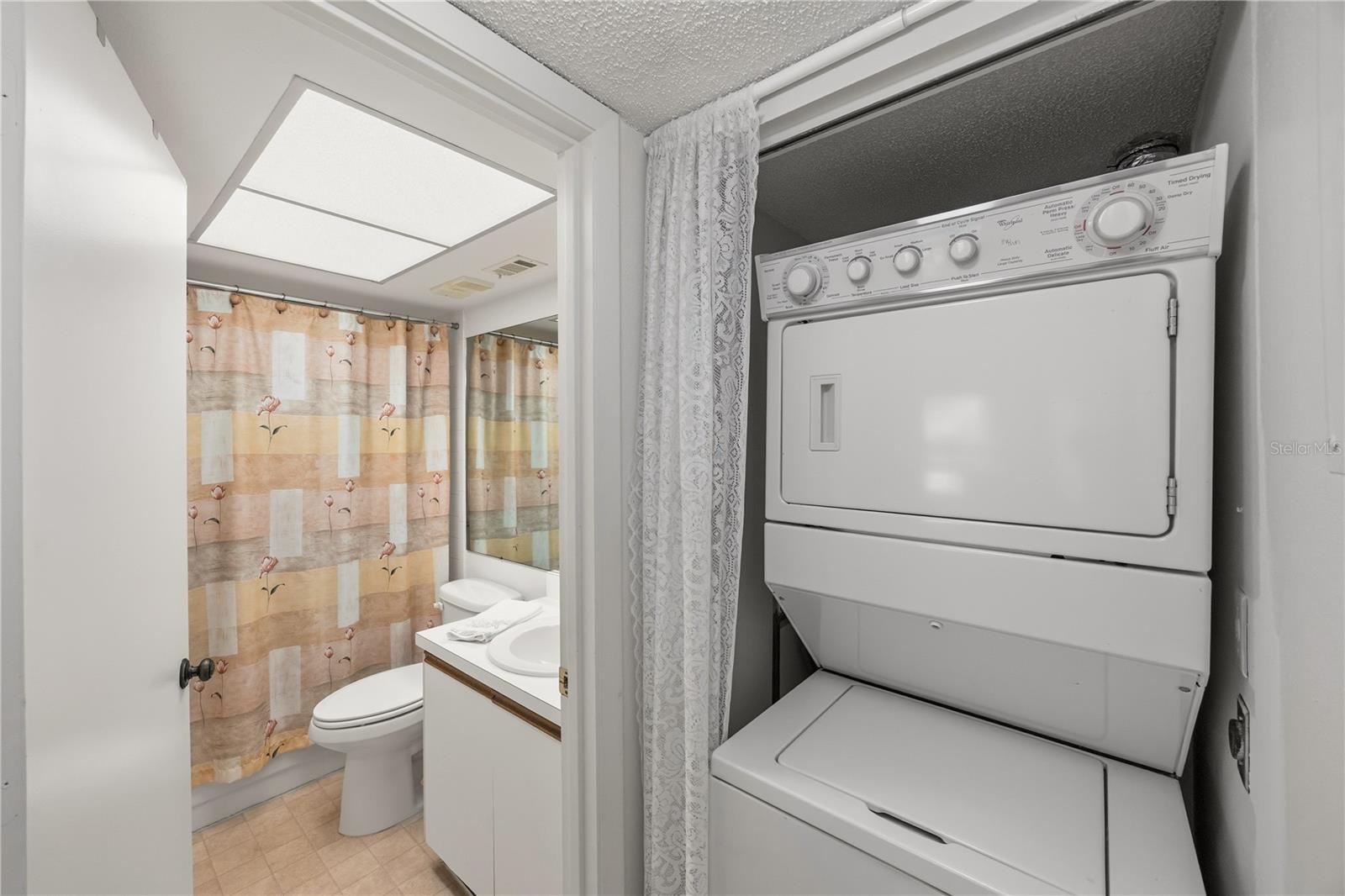 Secondary Bathroom and Laundry Area