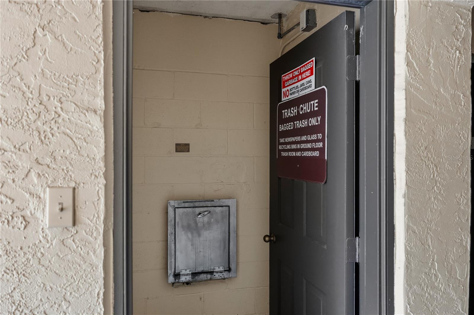 Convenient Trash Shoot, Just Outside Storage Unit