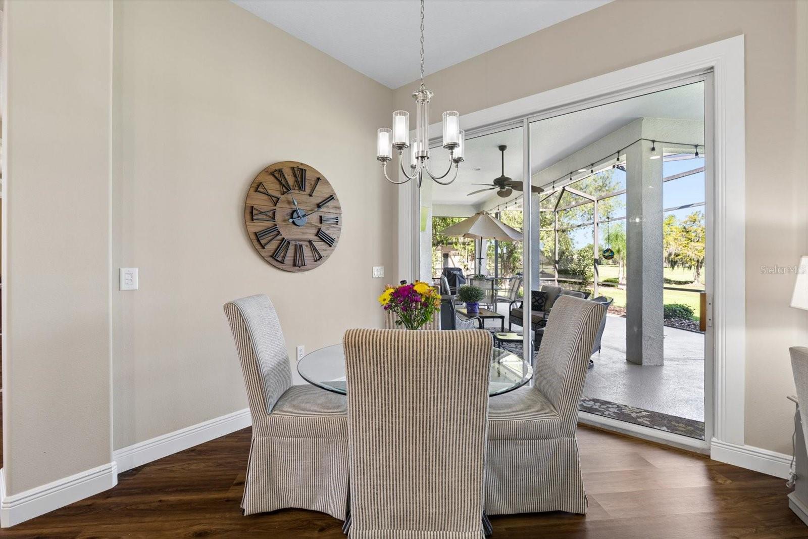 Kitchen nook overlooking patio and golf course
