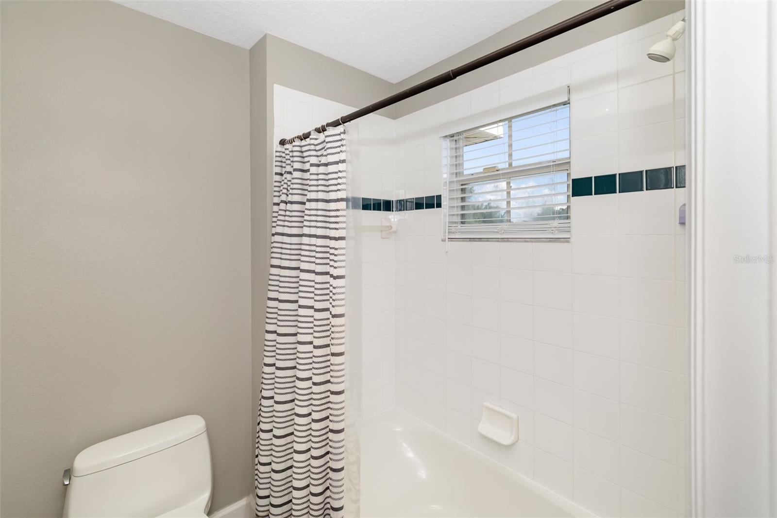 Bathroom 3 - Tub/Shower, with door that closes for privacy from vanity area