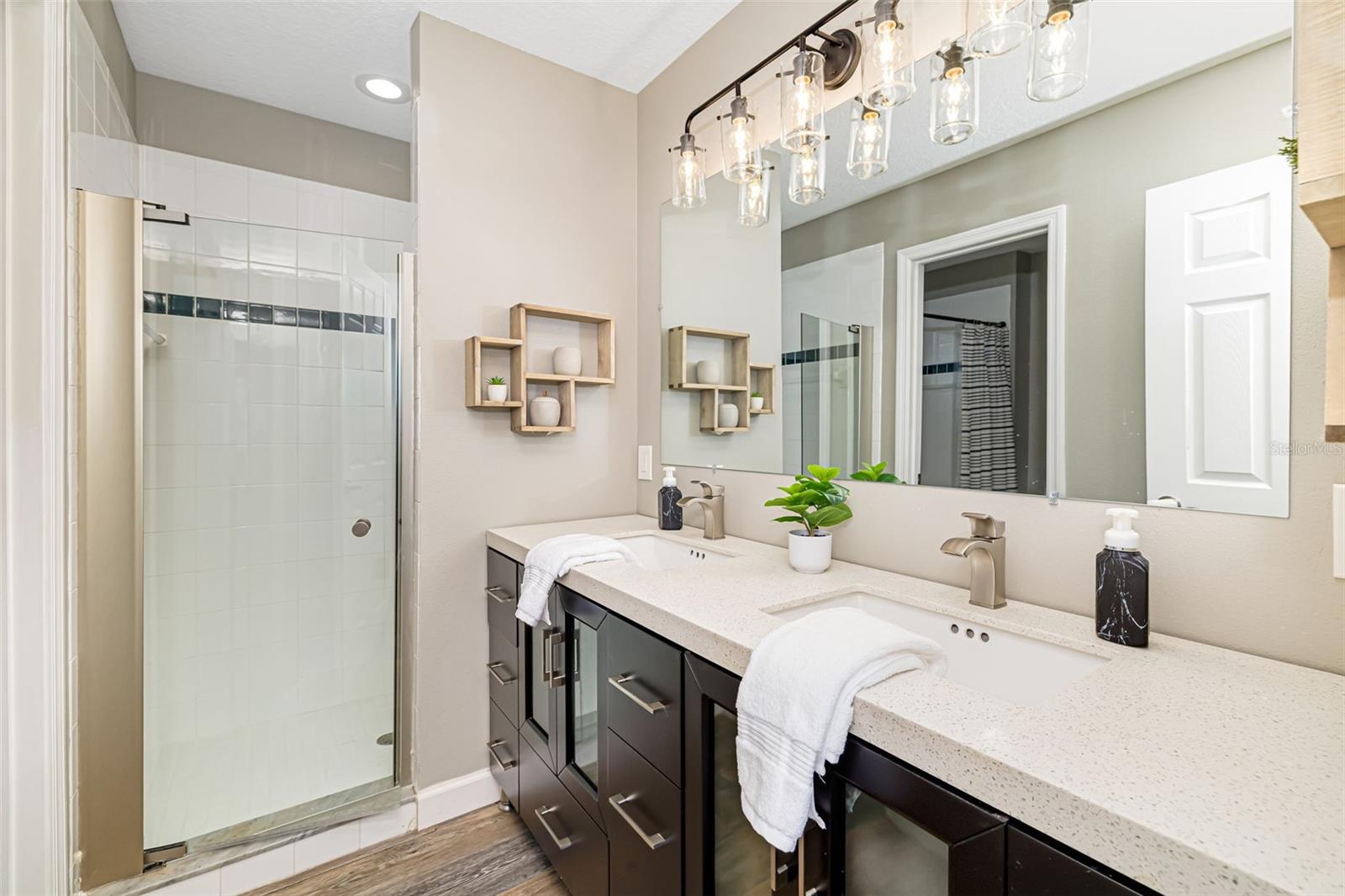 Bathroom 3 - Upstairs with Dual Vanity, Separate Walk-In Shower with adjoining room with Toilet and Tub/Shower combination