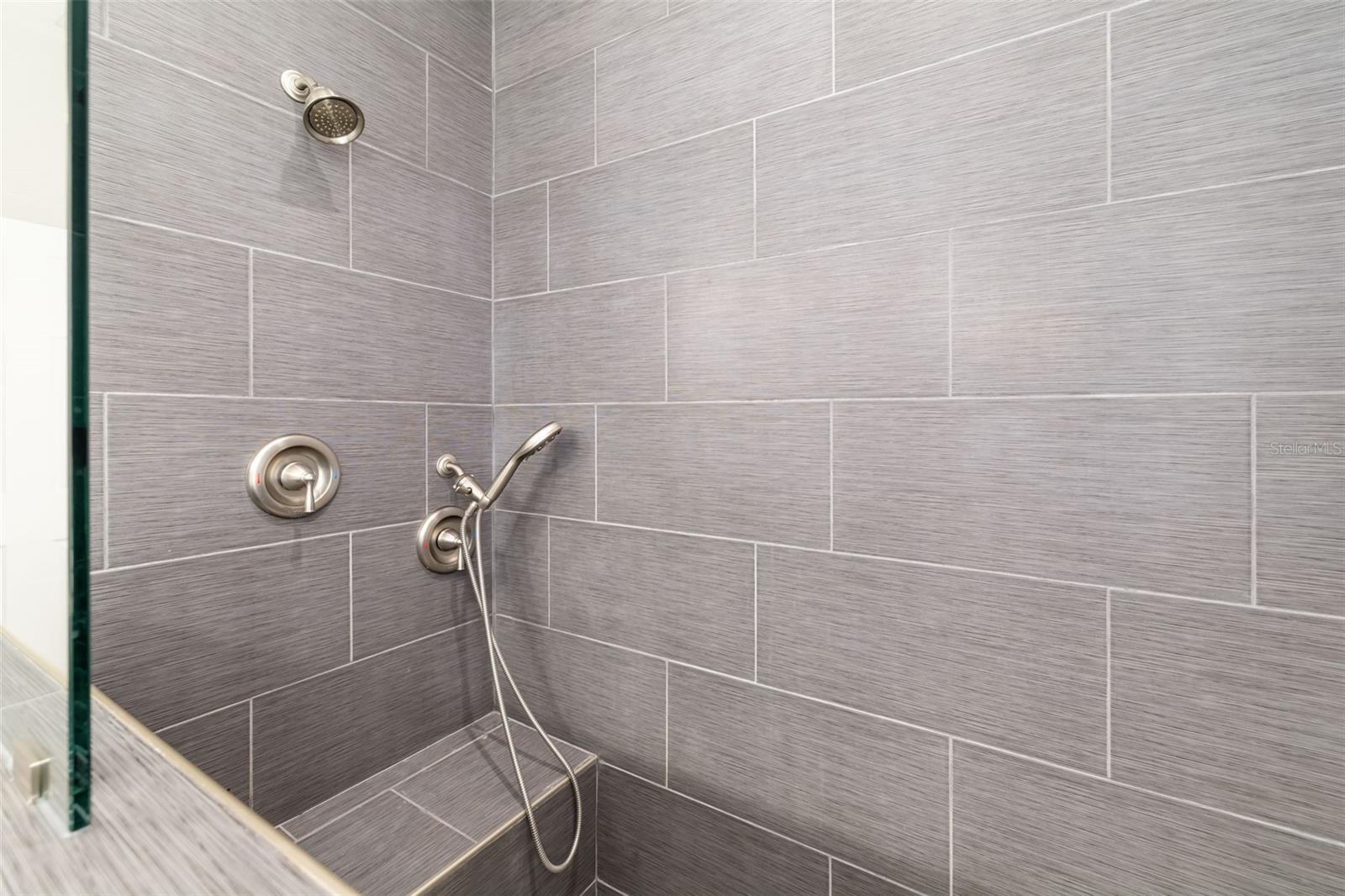 Primary Bathroom - Walk-In Shower w/bench, multiple shower heads