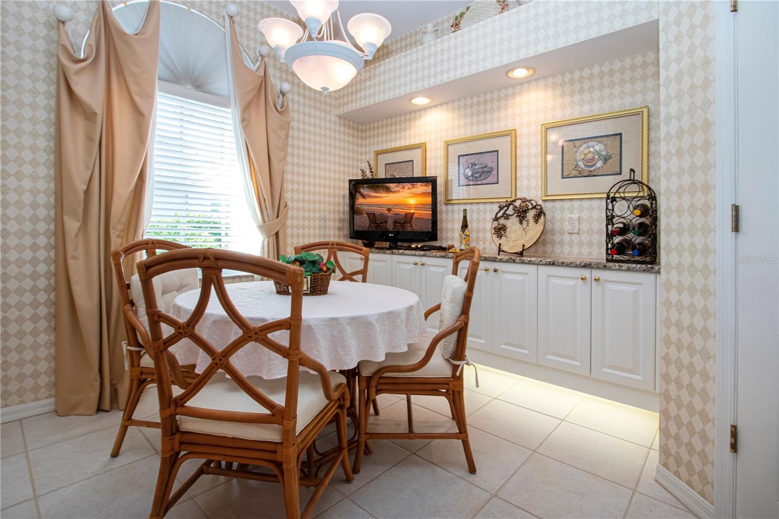 Kitchen table and lighted buffet server