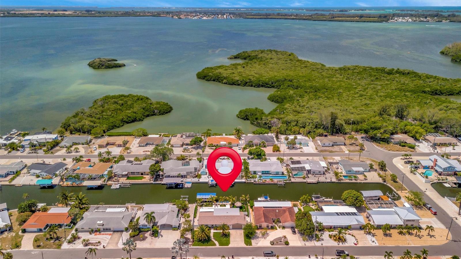 Near Palma Sola Causeway Park, with convenient access to Bradenton and Sarasota shopping, dining, and amenities.